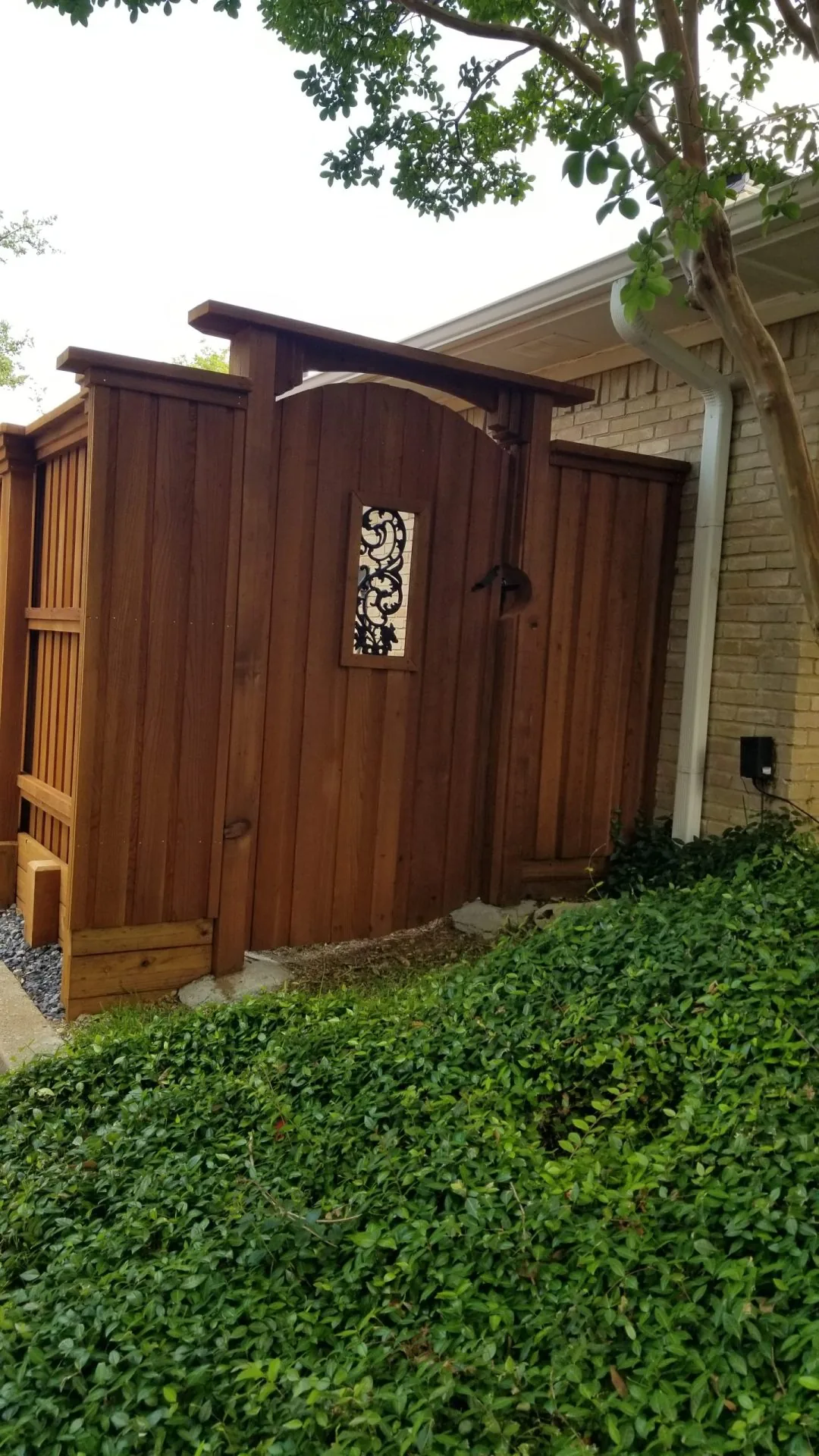 Custom wood gate installed by Fencetastic
